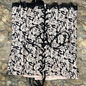Elegant Black and light pink Floral Corset by BEBE. NWT